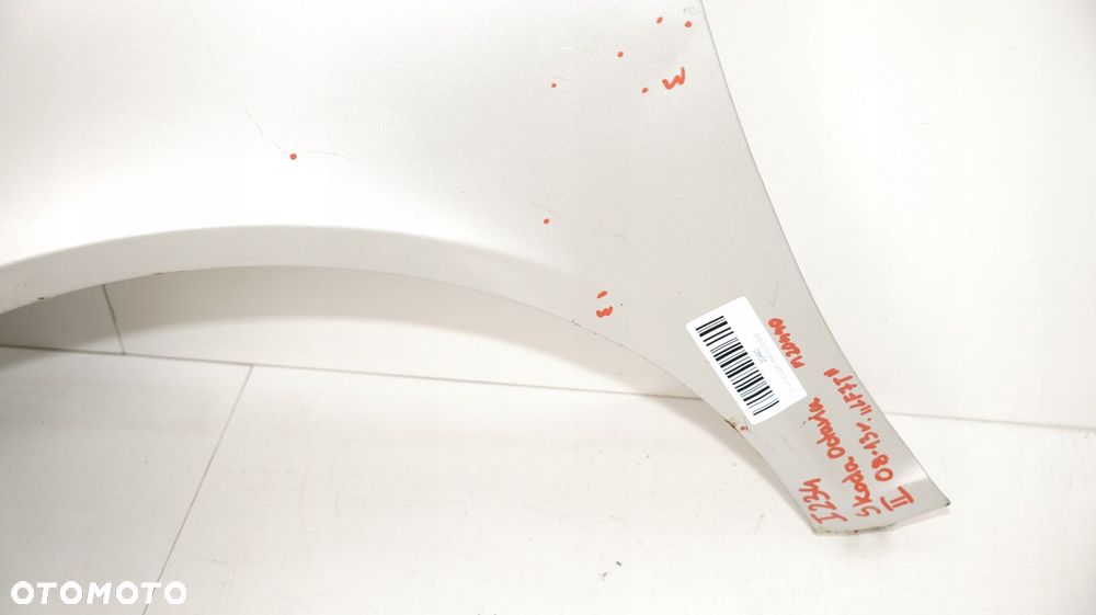 BŁOTNIK LEWY PRZÓD SKODA OCTAVIA II LIFT 08-13R LF7T - 16