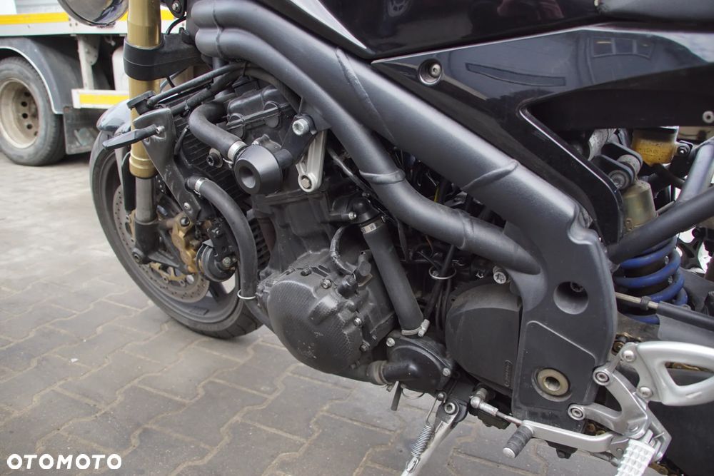 Motocykl na części - Triumph Speed Triple IV 1050 515NJ 131 KM 2005R Silnik Skrzynia Rama Lampa Siedzenie Gmol Przełącznik Manetka Laga Monowahacz Amortyzator Owiewka Osłona Sterownik Moduł Czujnik Licznik - 14
