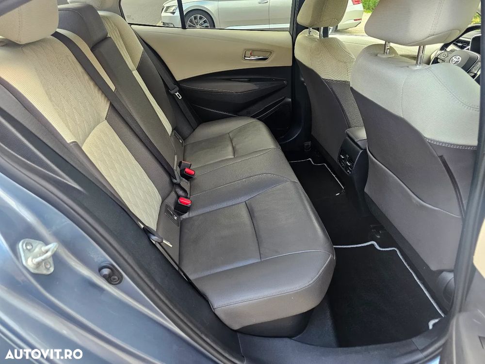 Toyota Corolla 1.8 HSD Exclusive - 23