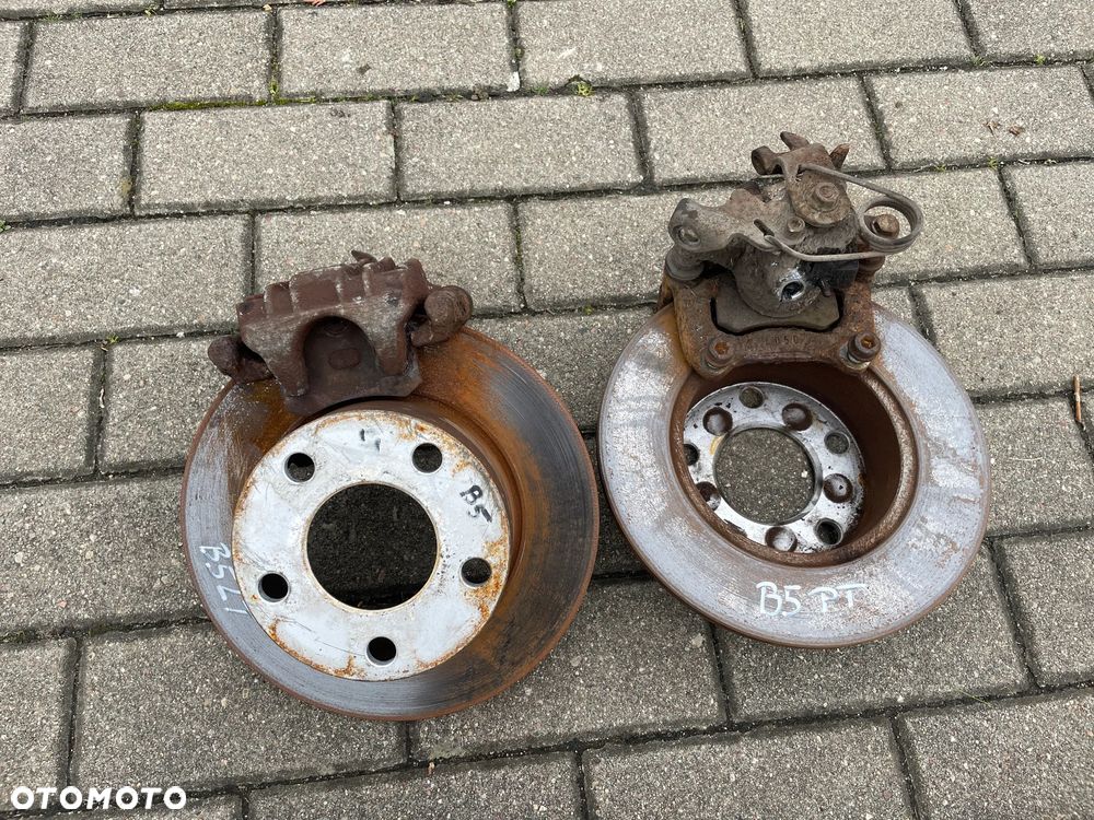 Tarcze klocki hamulcowe zacisk lewy prawy jarzmo tył Audi Vw A4 A6 C5 PASSAT B5 - 1