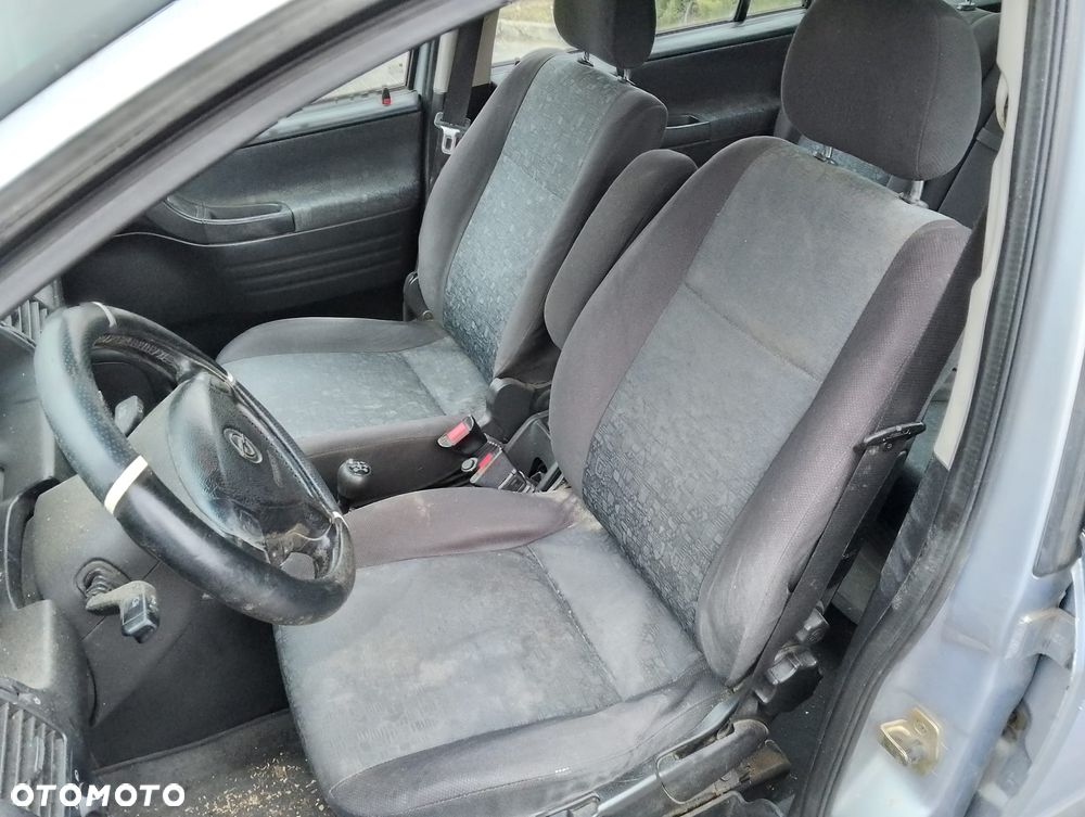 Opel Zafira A (99-03r.) 2.0 D 81KM. Silnik X20DTL / Y20DTL Skrzynia F23 lakier Z151/151/94L  . Cały na części. GWARANCJA !!!  Przód Tył Zestaw Komplet Drzwi Klapa Zderzak Błotnik Maska Grill Atrapa Szyba Pas Lampa Lusterko Boczki Fotel Kanapa Kokpit Deska Rozdzielcza Przełącznik Włącznik Sterownik Przewody Wiązka Instalacja Moduł Komputer Czujnik Listwa Pompa Alternator Wtryski Głowica Rozrusznik Kompresor Sprzęgło Dwumas Silnik Skrzynia ABS Klimatyzacji Paliwa Wspomagania Kolektor Turbina Przepustnica Zawór Chłodnica Koło Hak Belka Sanki Zawieszenie Mcpherson Półoś Amortyzator Wydech Tłumik Zacisk Most - 8