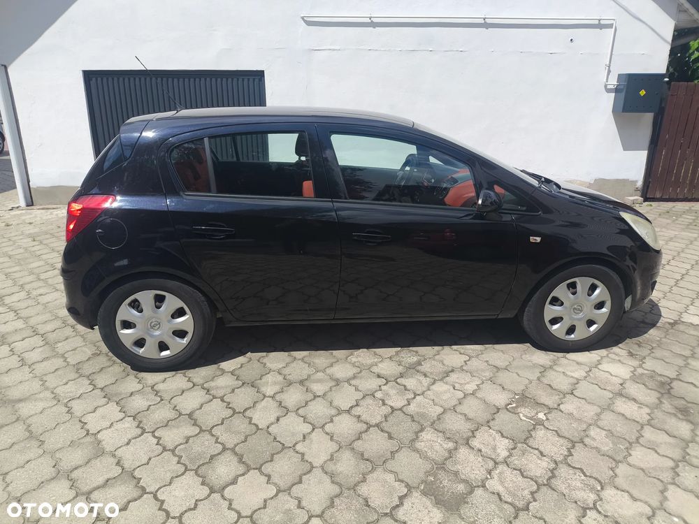 Opel Corsa 1.4 16V Enjoy - 9