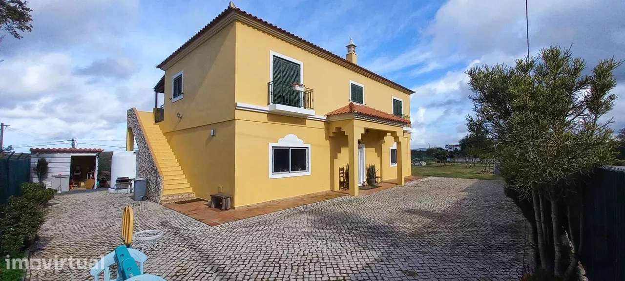 Moradia mista com espaço comercial de 150 m², T2 independente e terren - Grande imagem: 2/44