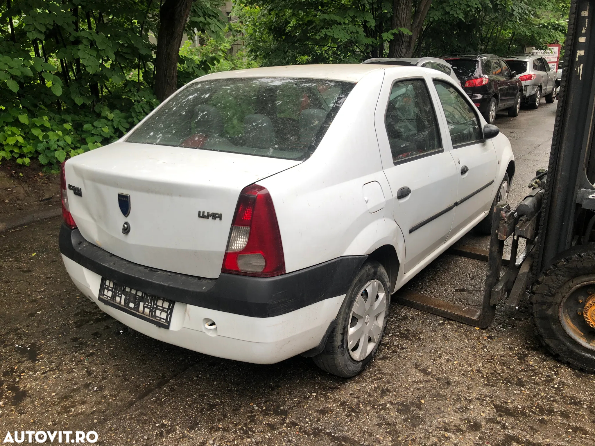 Dezmembrez Dacia Logan 2006 alb 1.4 MPI - 8