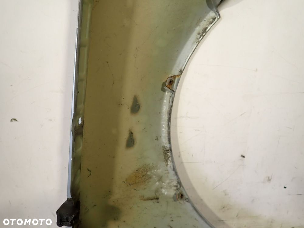 BŁOTNIK LEWY PRZEDNI VOLKSWAGEN BORA - 12