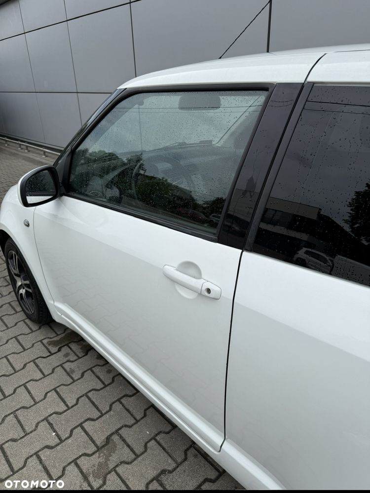 Suzuki Swift 1.3 Club - 4