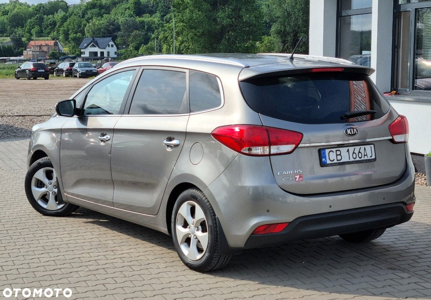 Kia Carens - 4