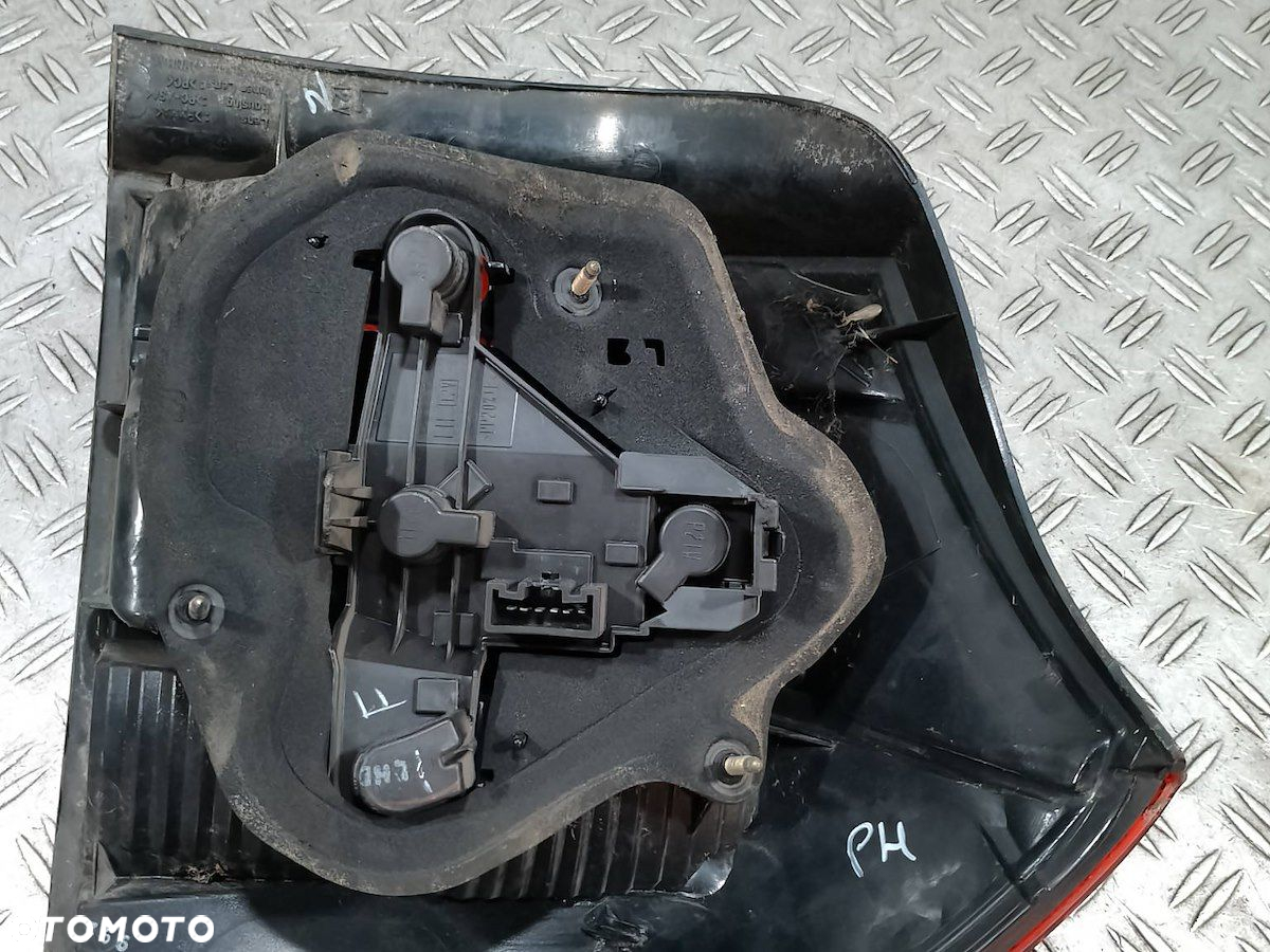 LAMPA TYLNA LEWA TOYOTA COROLLA E12 HATCHBACK - 2