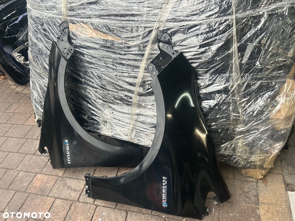 TOYOTA COROLLA E21 HB BŁOTNIK LEW/PR.209 ORG. - 2