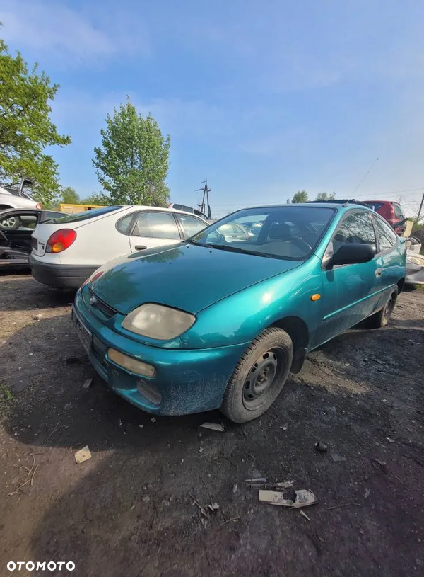 Części- Mazda 323 1489 65kW benzyna 1998r.