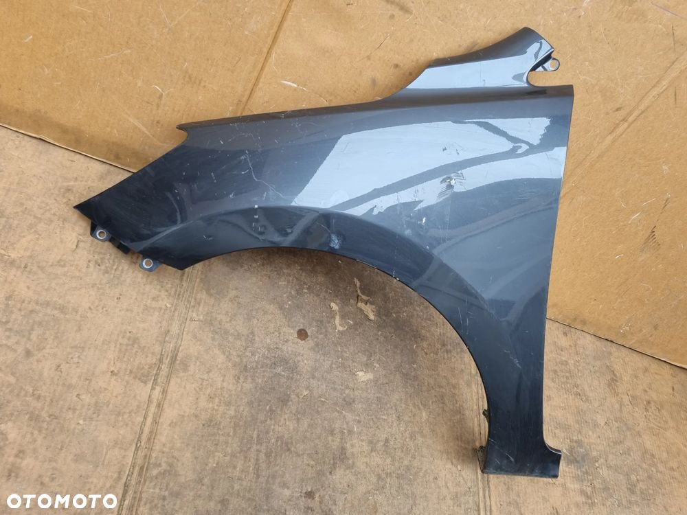 KIA RIO IV 4 LEWY BŁOTNIK PRZEDNI