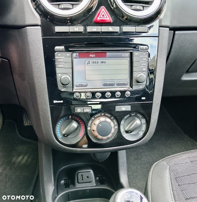Opel Corsa 1.2 16V Cosmo - 12