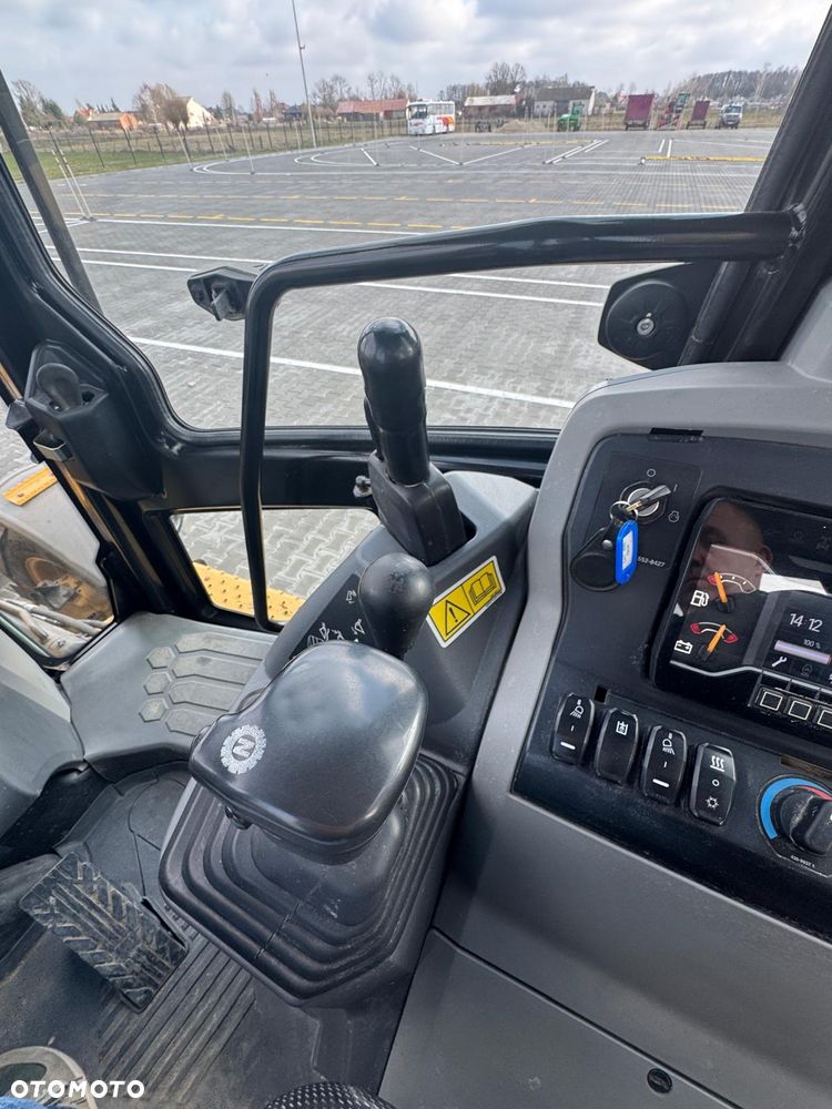 Caterpillar 428 - 37