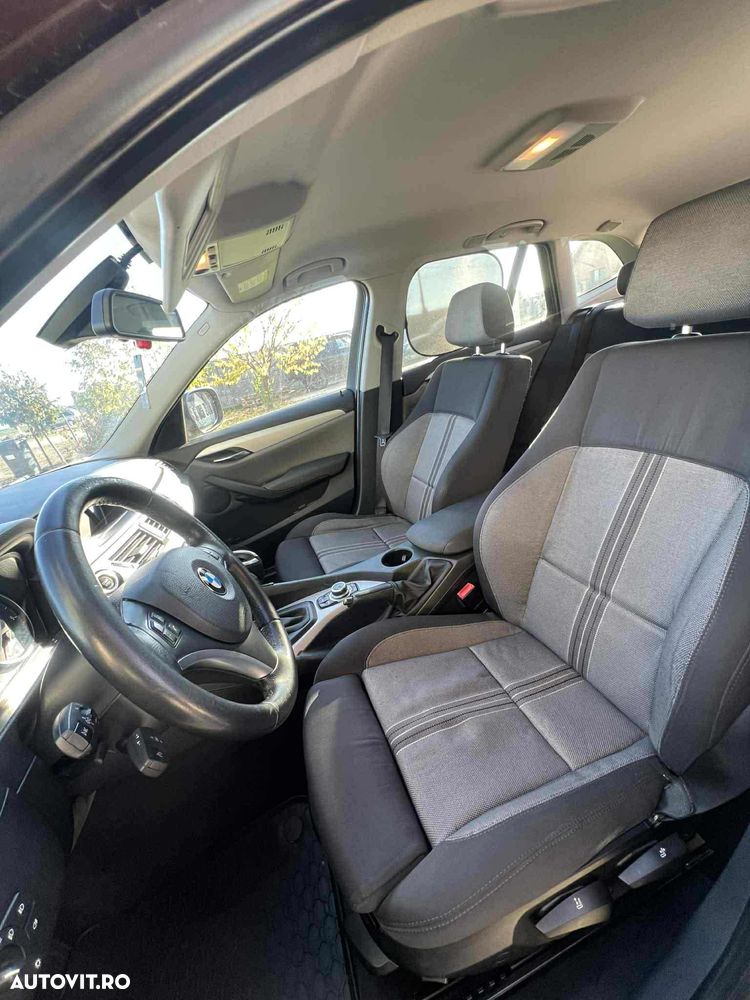 BMW X1 2010 — imagine 11