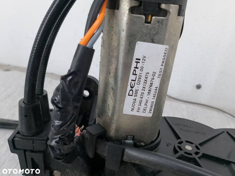 MECHANIZM DRZWI PRZESUWNYCH LEWY PEUGEOT 1007 9680508180 1.4 - 4