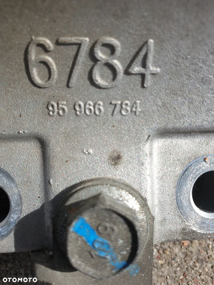 Łapa Chevrolet Spark M300 III 2011r Oryginał demontaż 1.0 95966784 - 2