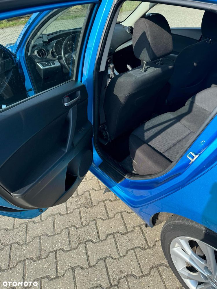 Mazda 3 2.0 Exclusive + - 9