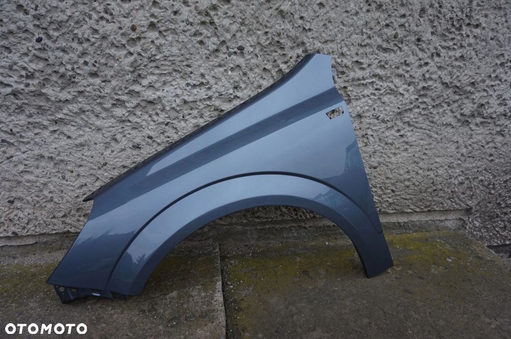 BŁOTNIK PRZEDNI LEWY OPEL ASTRA III H Z155 - 1