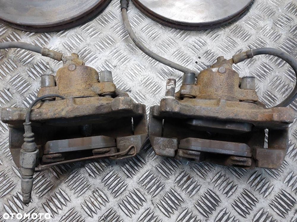 TARCZE HAMULCOWE PRZÓD + KLOCKI + ZACISKI VOLKSWAGEN PASSAT B6 2.0 TDI - 2