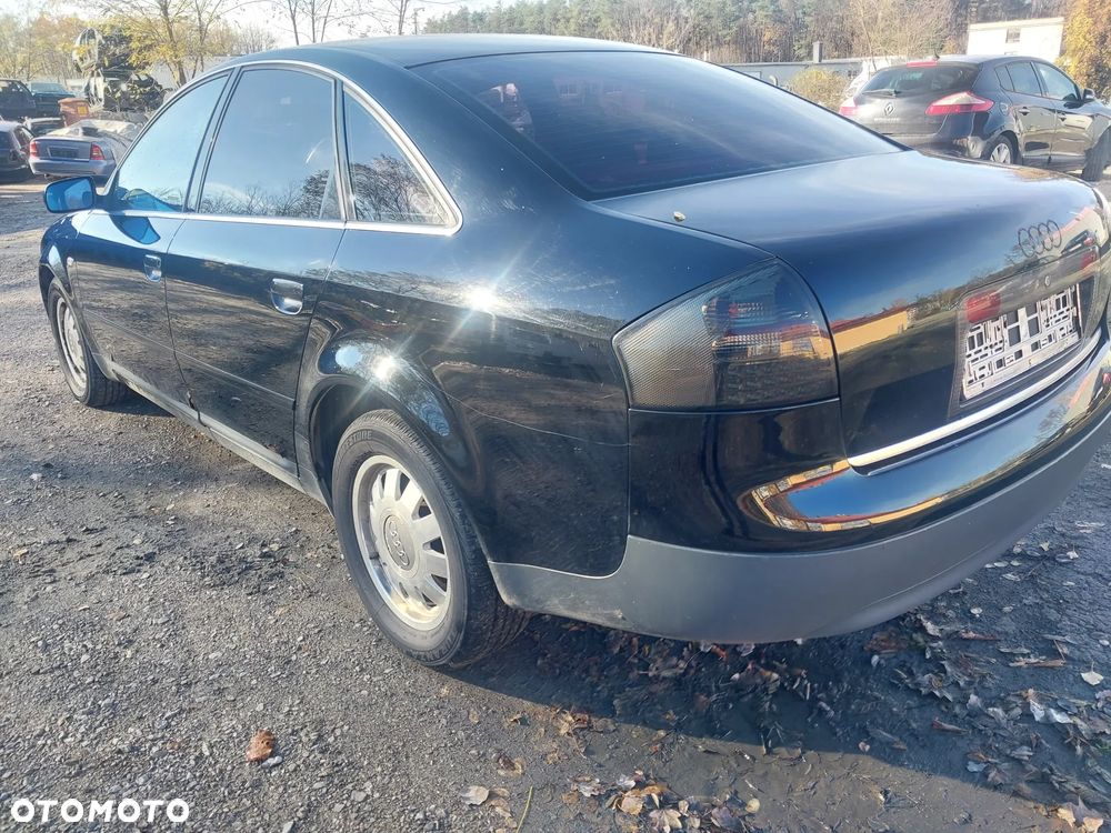 Audi A6 C5 sedan silnik kompletny 1.8 Turbo AEB turbina turbosprężarka cewka wiązka przepustnica przepływomierz kolektor skrzynia biegów DHW sprzęgło dwumasa drzwi lewe prawe klapa błotnik lusterko kolor LY9B czarny maglownica wydech tłumik lampa tył tylna blenda belka rura dolotowa przewód podłokietnik sterownik panel boczki fotele grzane alufelgi szyba dekory NA CZĘŚCI WSZYSTKIE CZĘŚCI - 9