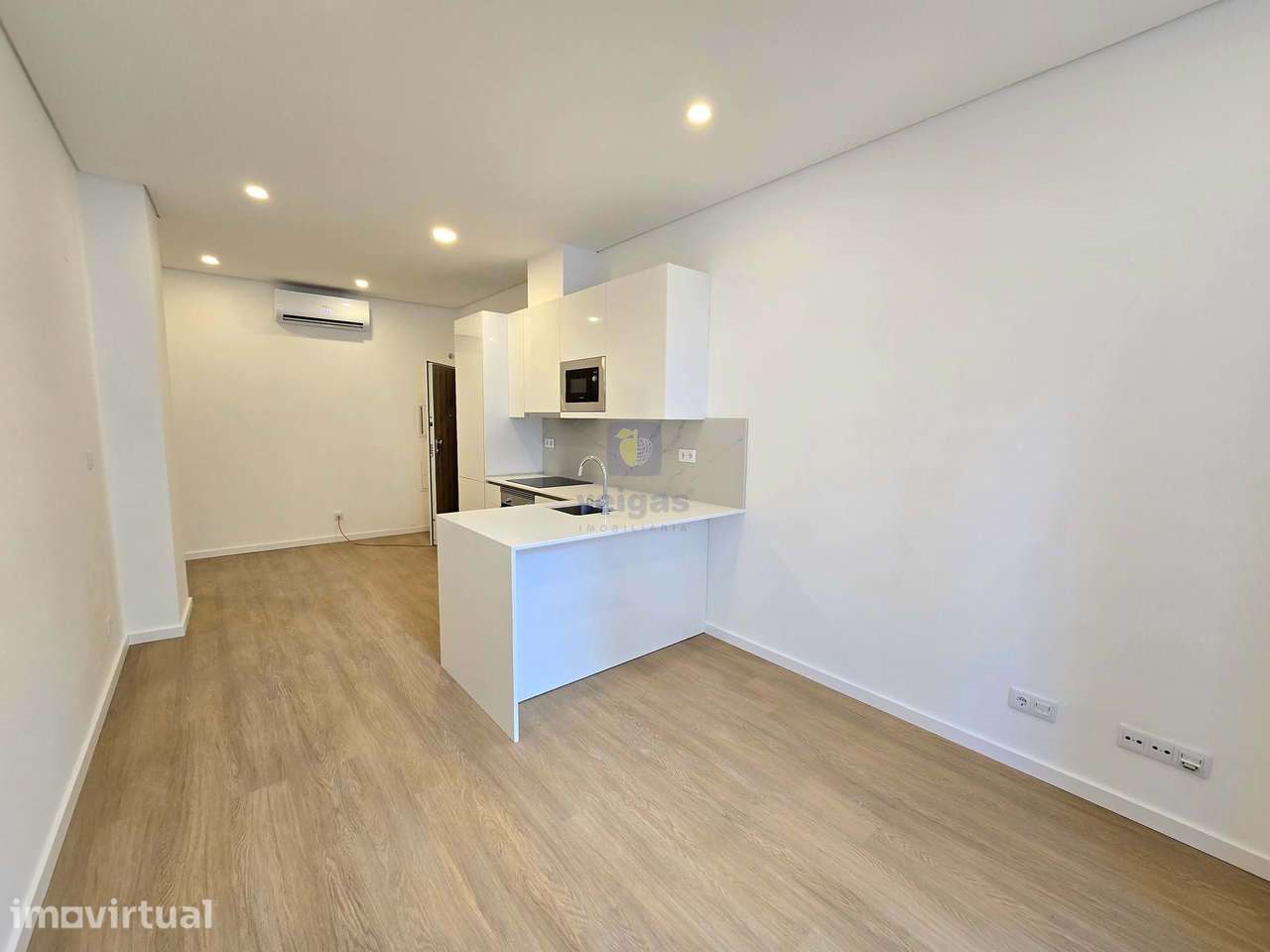 Apartamento T2 com terraço com duas frentes ao nível do RC no empreend - Grande imagem: 3/20