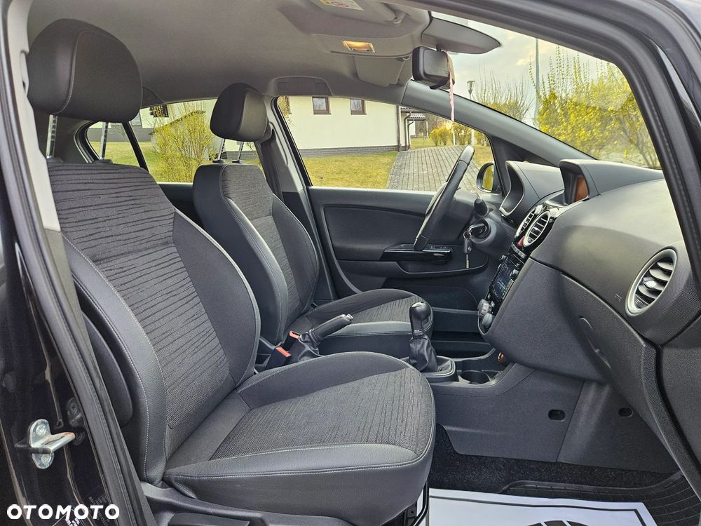 Opel Corsa 1.4 16V Active - 11