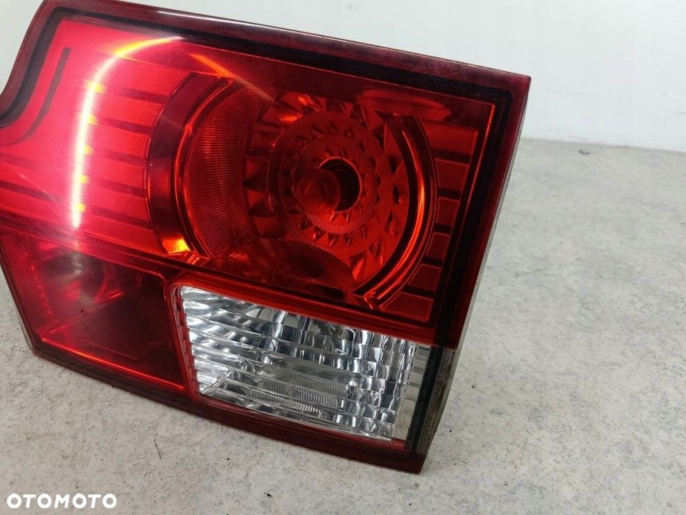 SSANGYONG KYRON PRAWA TYLNA LAMPA KLAPA ORYGINAŁ 83604-09 - 2