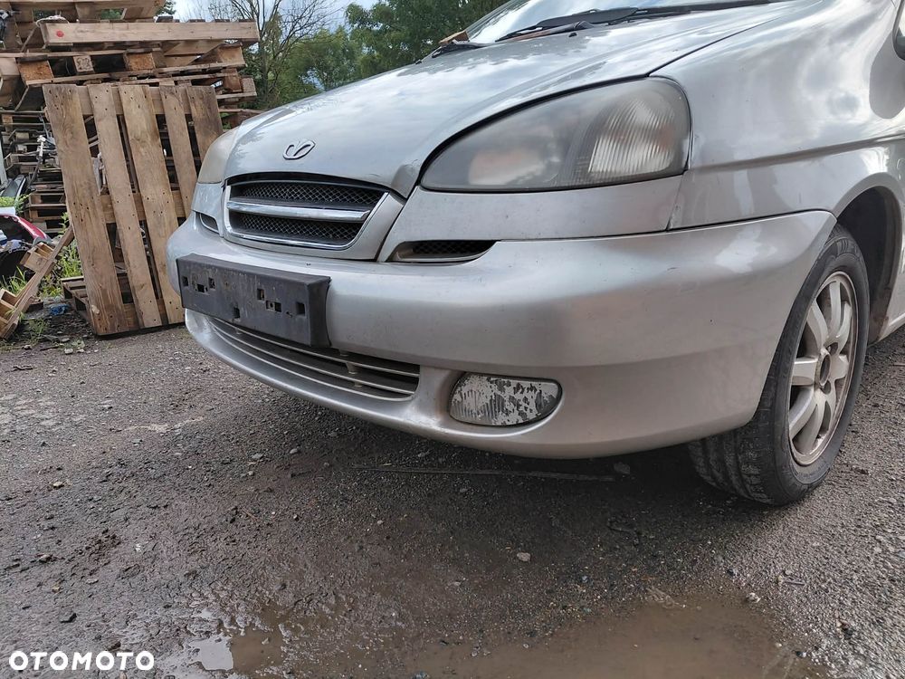 części DAEWOO REZZO 2004r. 2.0 16V benzyna 89kw ZDERZAK PRZÓD 92U - 1