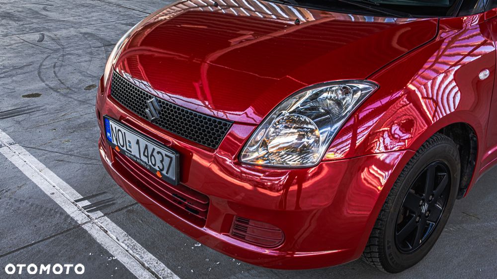 Suzuki Swift 1.3 Club - 4