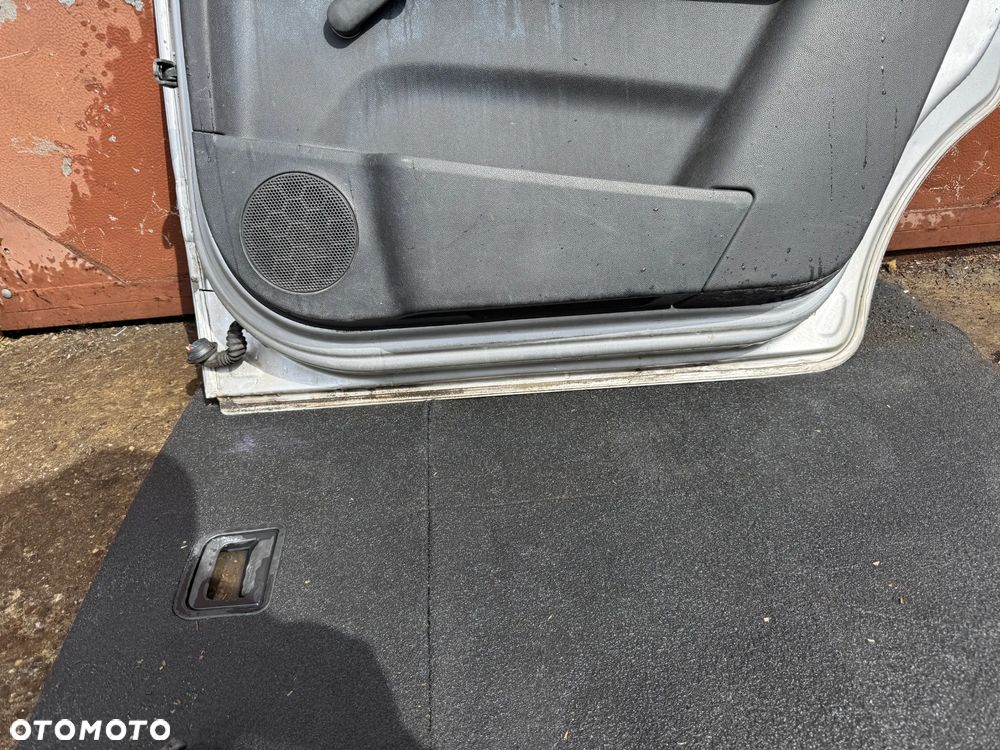 Drzwi prawe Opel Zafira B tył OE - 7