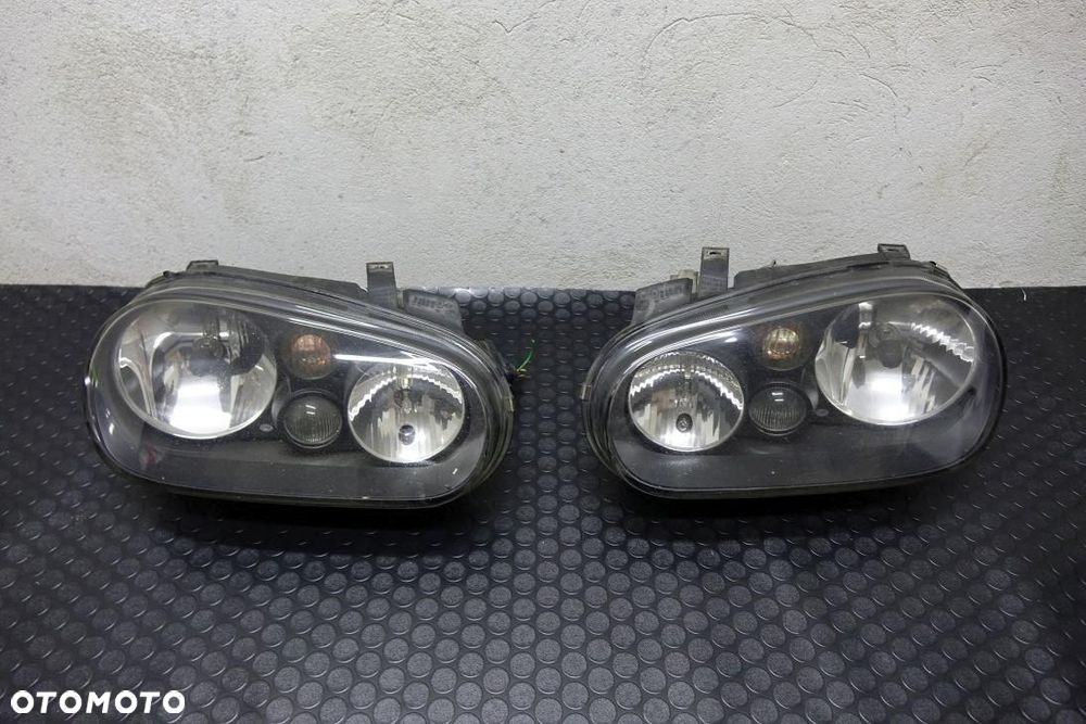 REFLEKTOR 2 SZT KPL EU LAMPY L+P HELLA OE VW GOLF IV 4 32424323 - 1