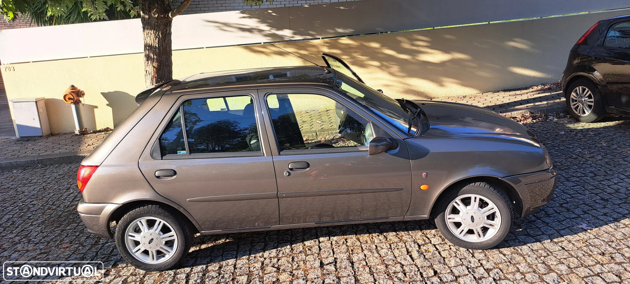 Ford Fiesta 1.25 Ghia - 10