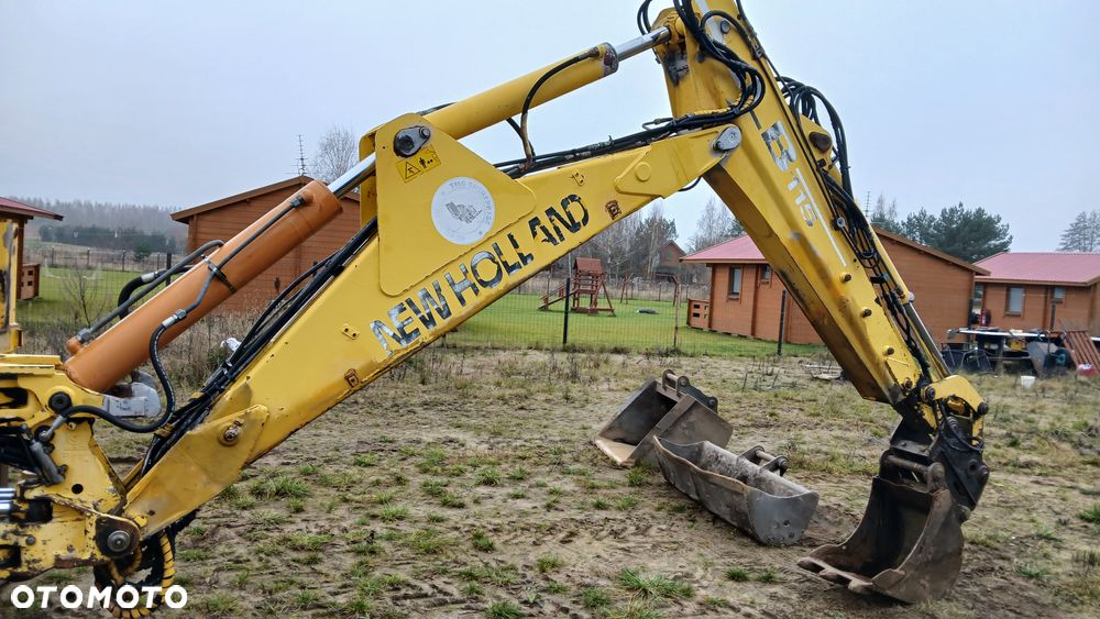New Holland LB 115 - 12