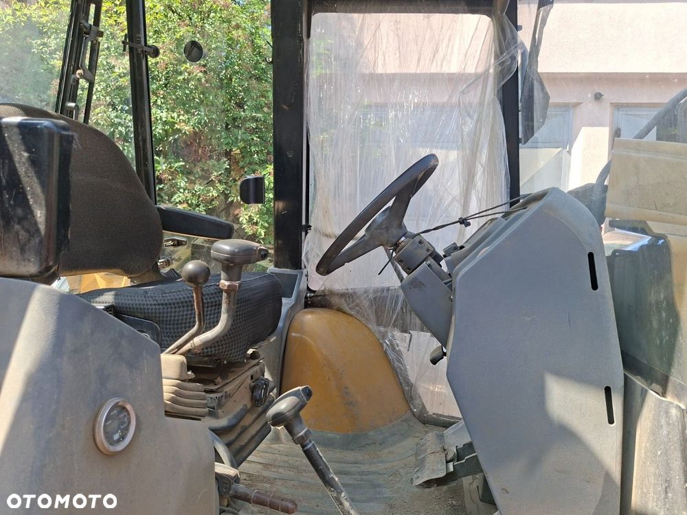 Caterpillar 428 C 4X4 - 8