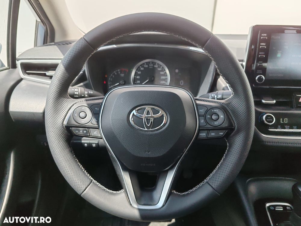 Toyota Corolla 1.8 HSD Business - 11