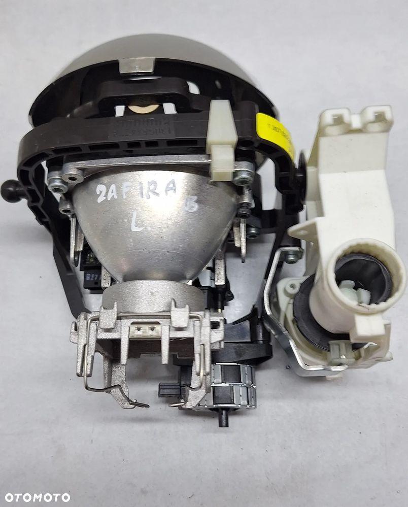 SOCZEWKA  LEWA , XENON  -OPEL ZAFIRA B LIFT / 2011 ROK / EUROPA - 3