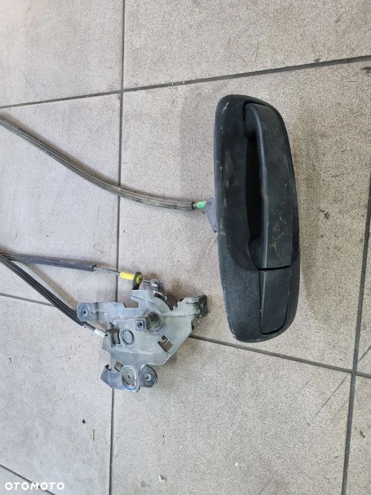 KLAMPA ZAMEK LINKI DRZWI PRAWYCH SUWANYCH TRAFIC VIVARO  01-14r. - 2