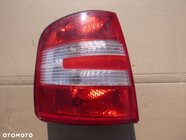 LAMPA LEWY TYŁ LEWA TYLNA SKODA FABIA I KOMBI LIFT 05-08 - 11