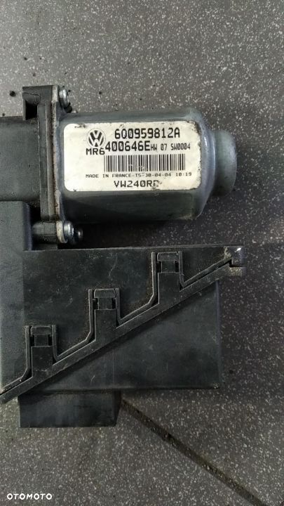 SILNICZEK OPUSZCZANIA PODNOSZENIA SZYB VW POLO 9N 600959812A - 2