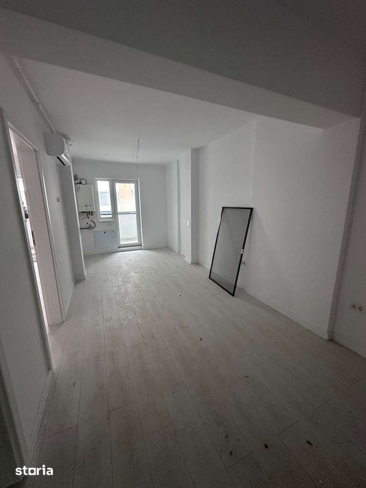 Apartament 2 camere finisat/Mutare imediata/7 minute de metrou Berceni — fotografia 3