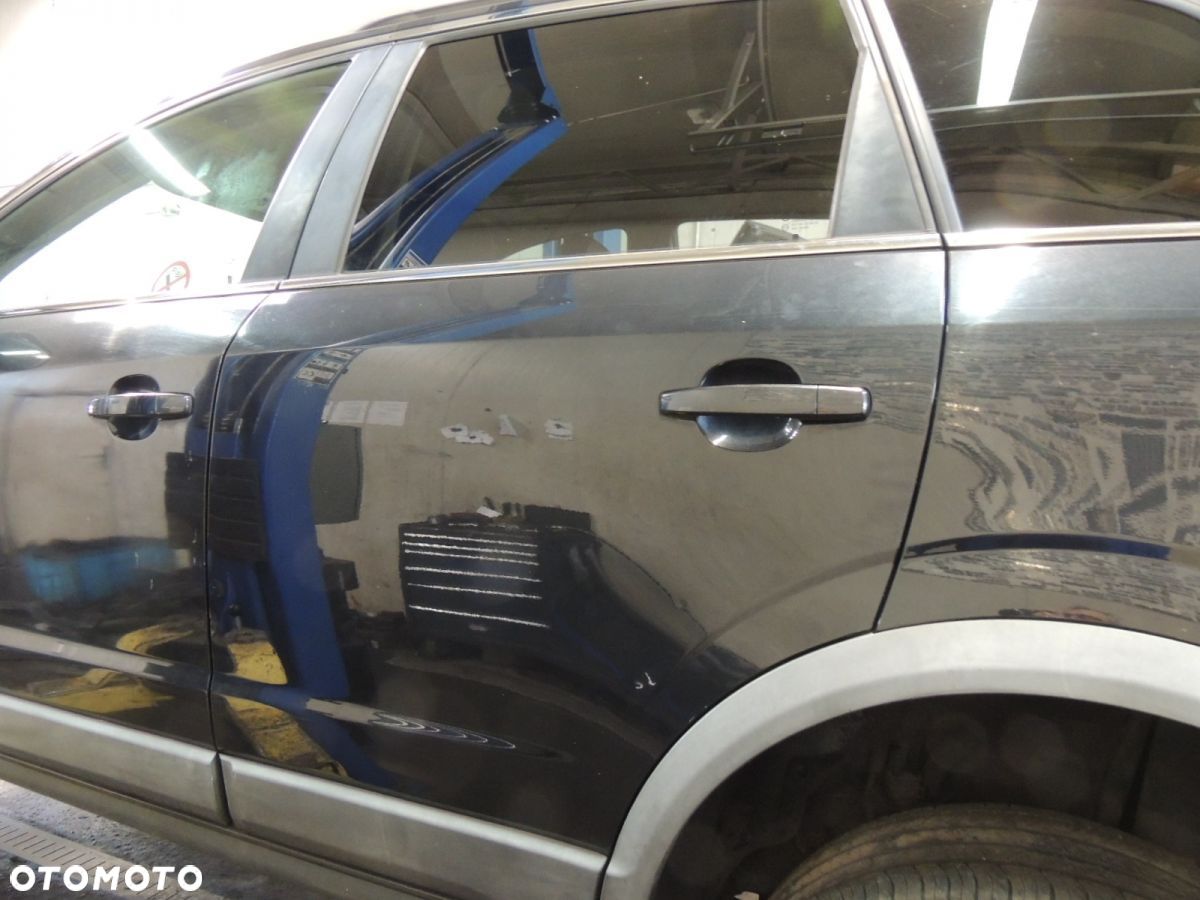 Drzwi lewy tył Opel ANTARA '12 2,2 - 1