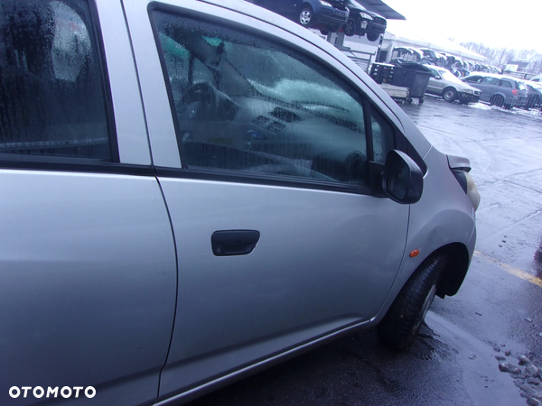 DRZWI PRAWY PRZÓD CHAVROLET CRUZE 08-12r SREBRNE