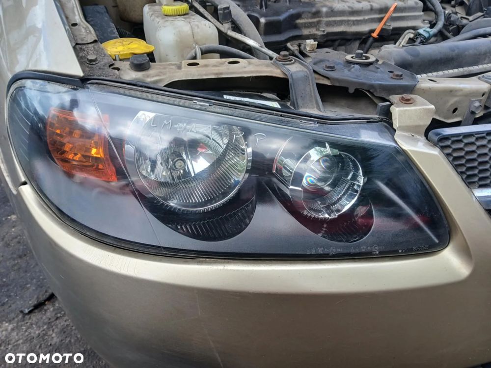 Nissan Almera N16 Lmpa przednia lewa, prawa - 1