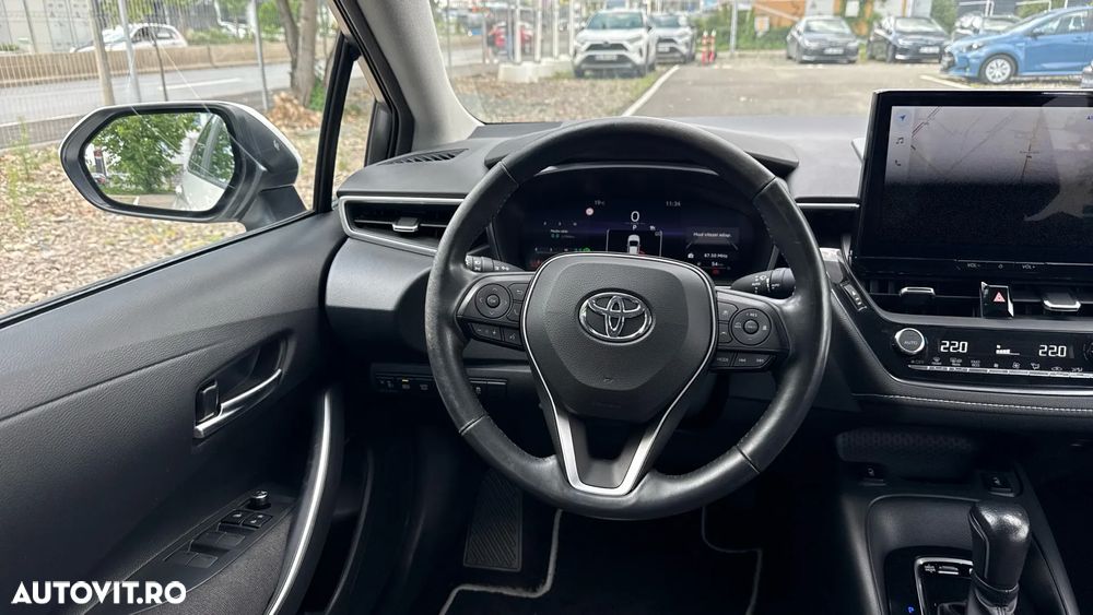 Toyota Corolla 1.8 HSD Business - 28