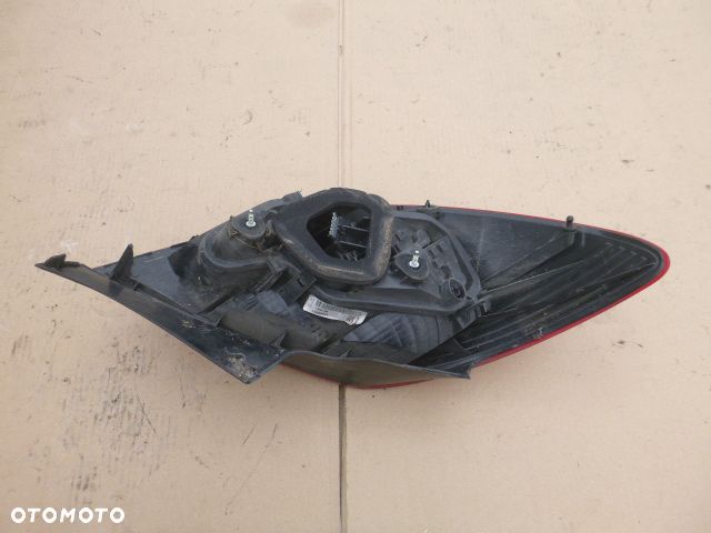 LAMPA PRAWY TYŁ PRAWA TYLNA OPEL CORSA D 06- - 4