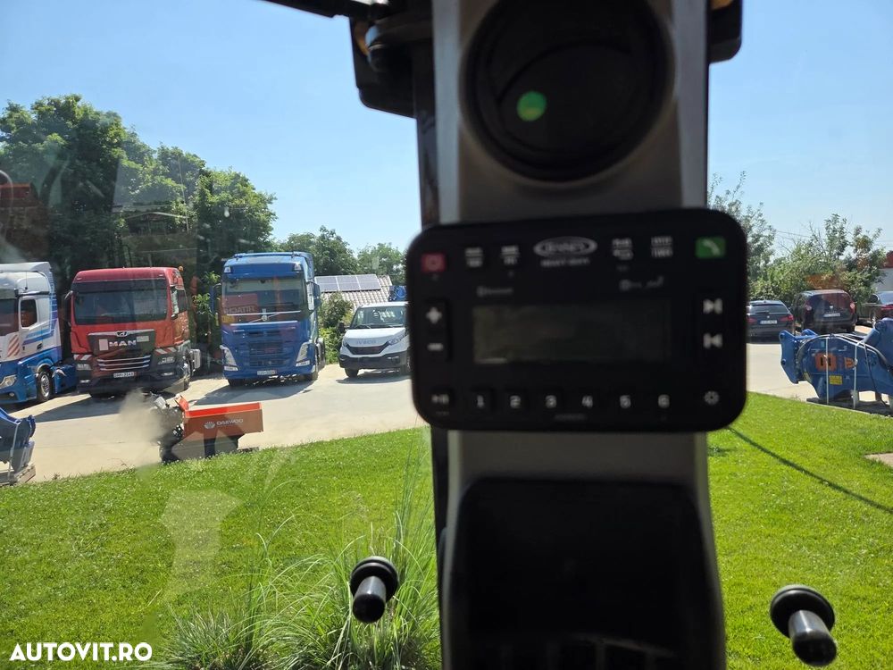 New Holland EX DEMO, 184h, B100D, FULL OPTION, 120CP, cutie automata POWERSHIFT, brat excavare extensibil cu inst picon pe el, MICHELIN, cupa multifunctionala 4x1, FURCI, Aer cond, Certificat CE, posibilitate leasing 4 ani-PROMOTIE 75.900 EUR+Tva - 31