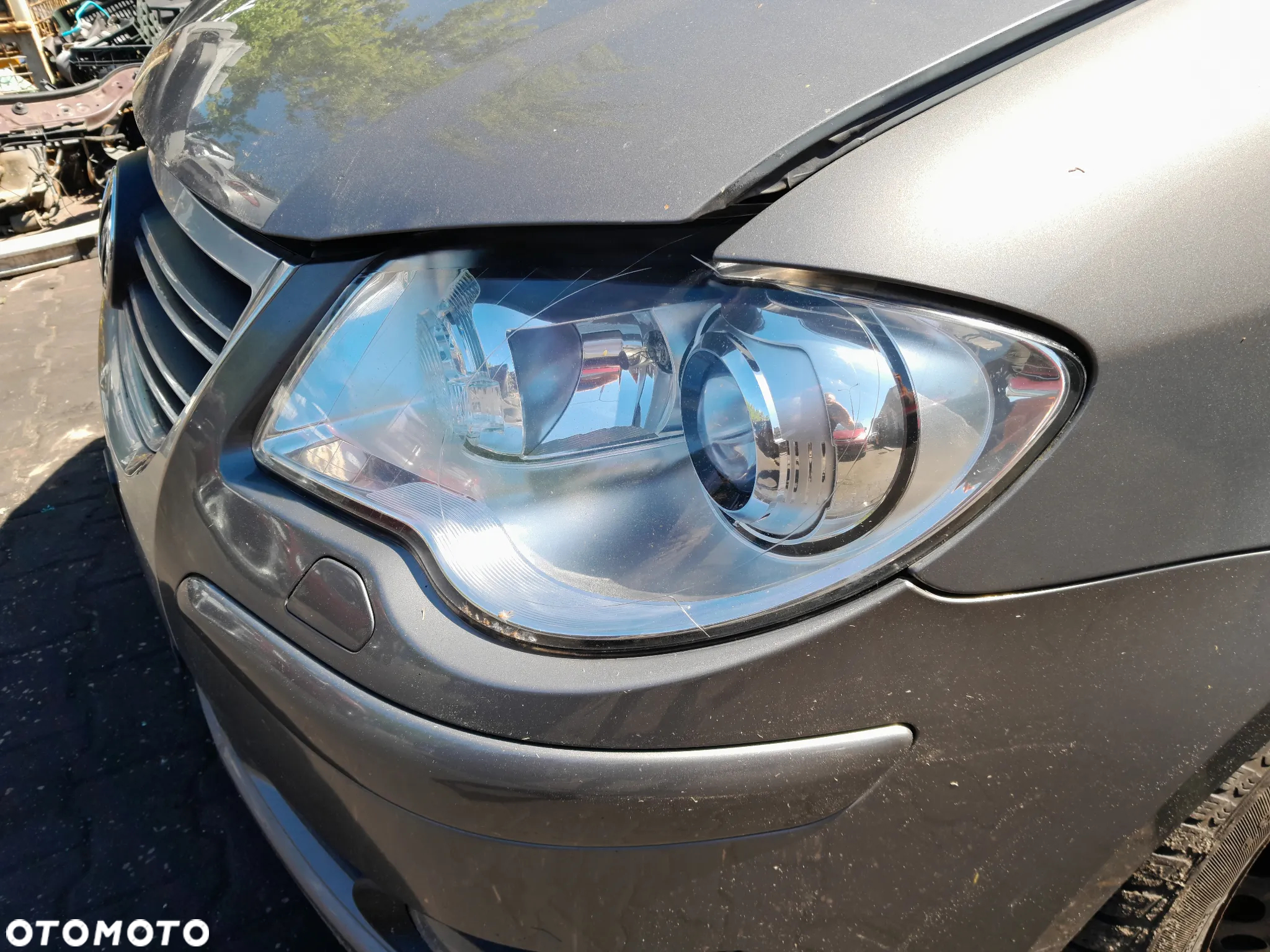 Lampa przednia lewa xenon VW Touran I lift 06-10r. - 3
