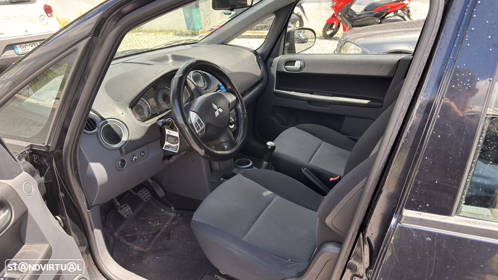 Mitsubishi Colt 1.1 E-motion - 13
