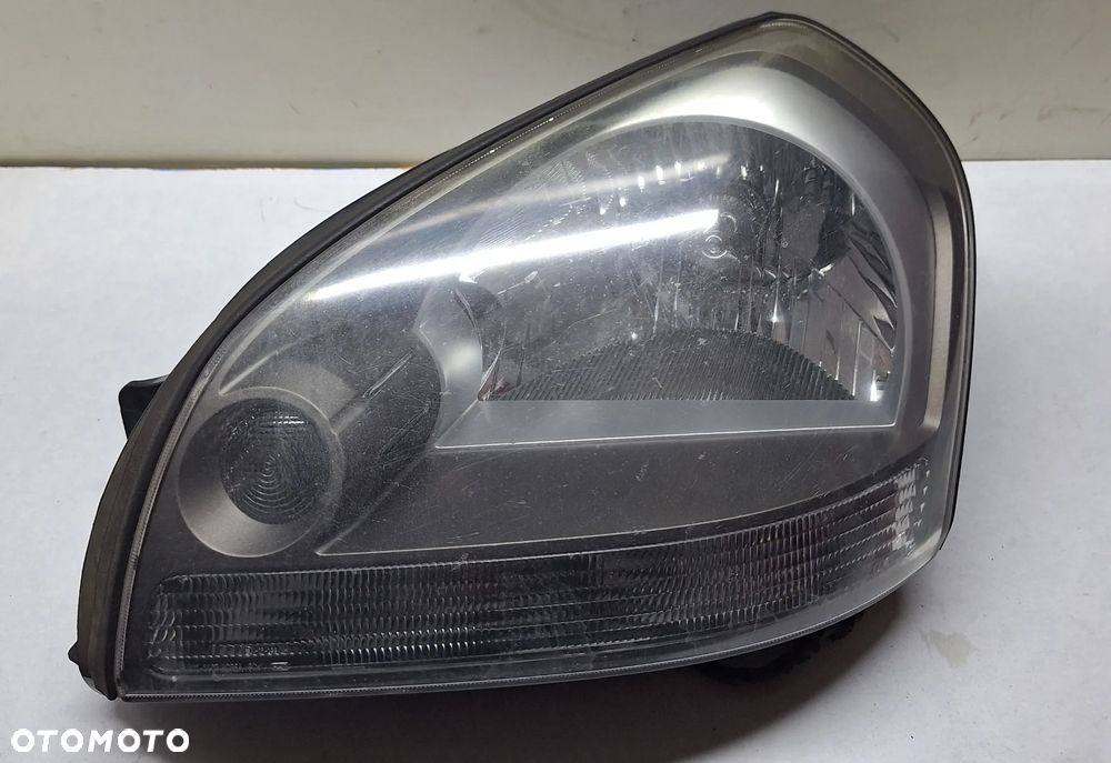 LAMPA PRZEDNIA LEWA -HYUNDAI TUCSON -2004-10 ROK / EUROPA - 1