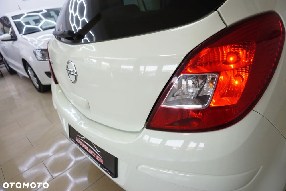 Opel Corsa 1.2 16V Enjoy - 18